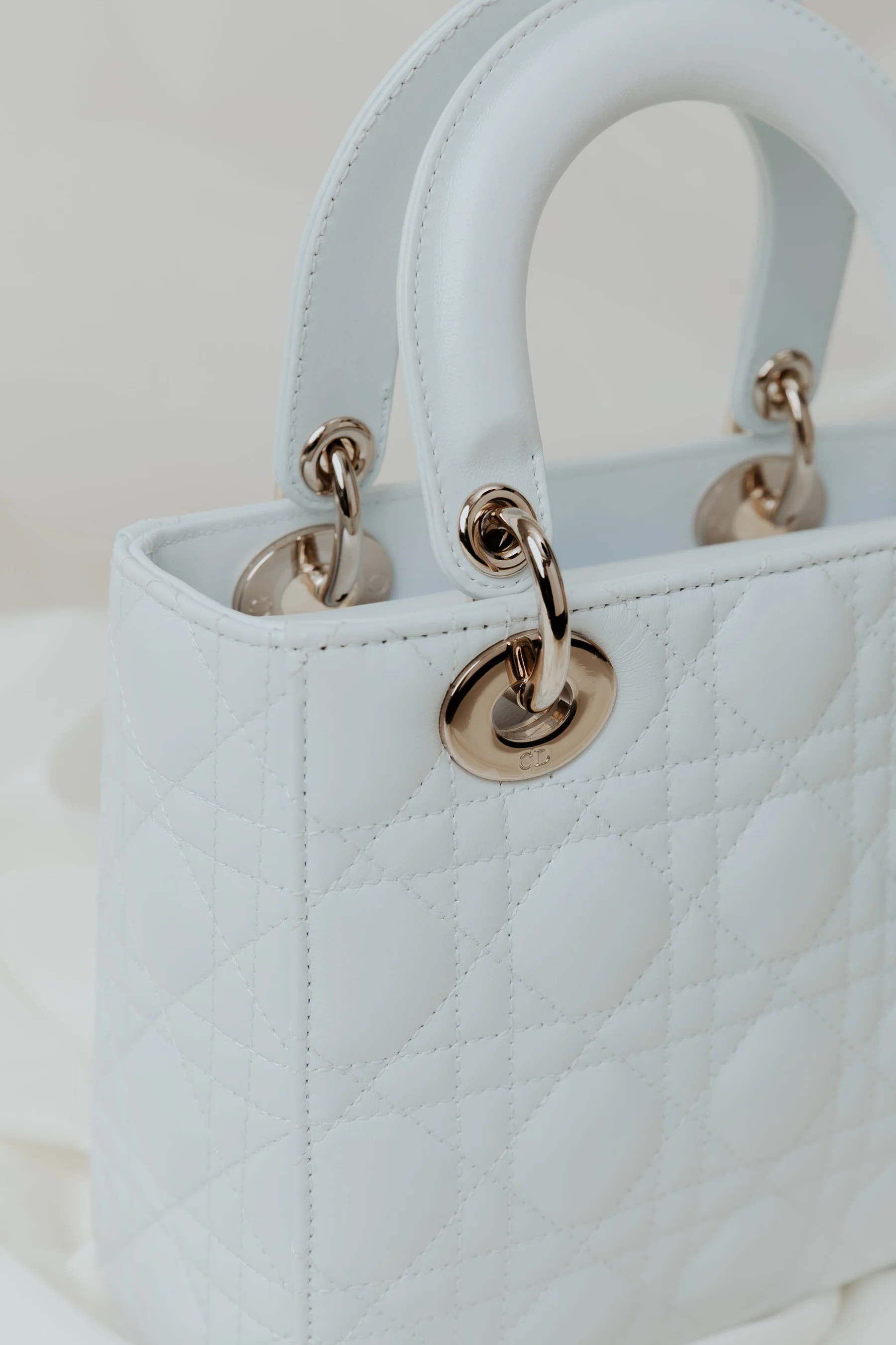 How To Spot A Fake Designer Handbag, From Industry Experts