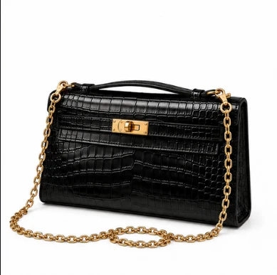 Hermès Kelly Pochette Black crocodile-embossed leather front view