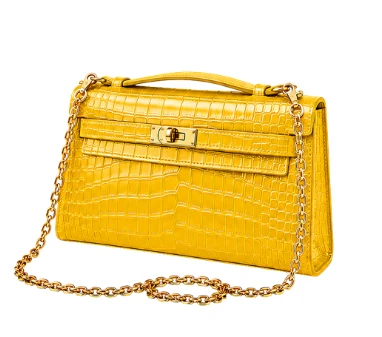 Hermès Kelly Pochette Yellow crocodile-embossed leather front view