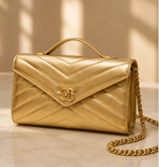 Chanel Chevron Wallet on Chain in Gold