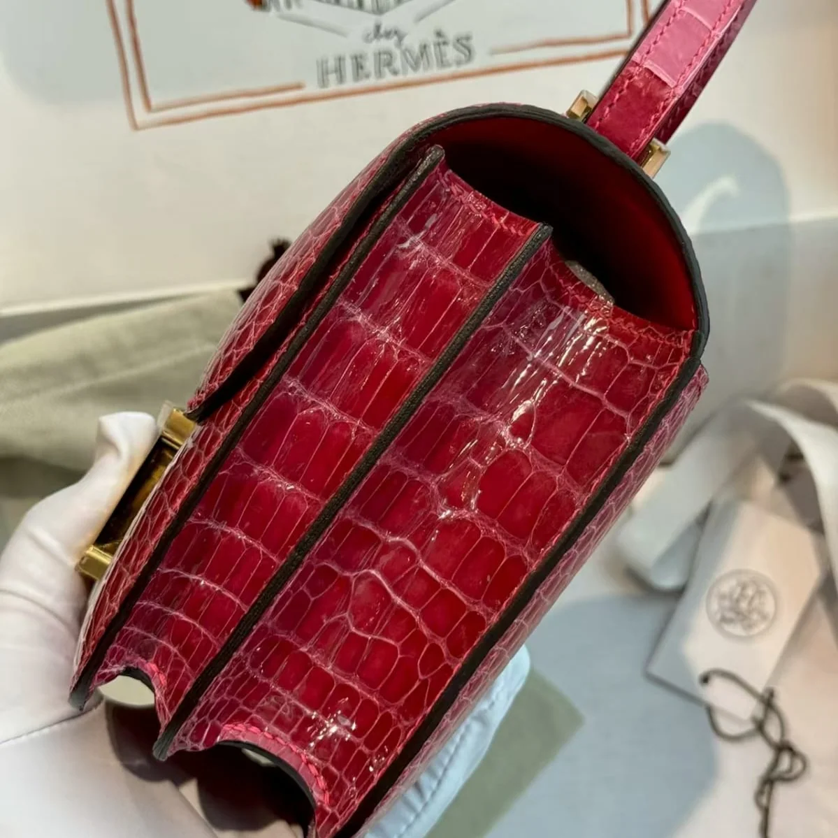 Hermès Constance 18 Red crocodile-embossed leather side view