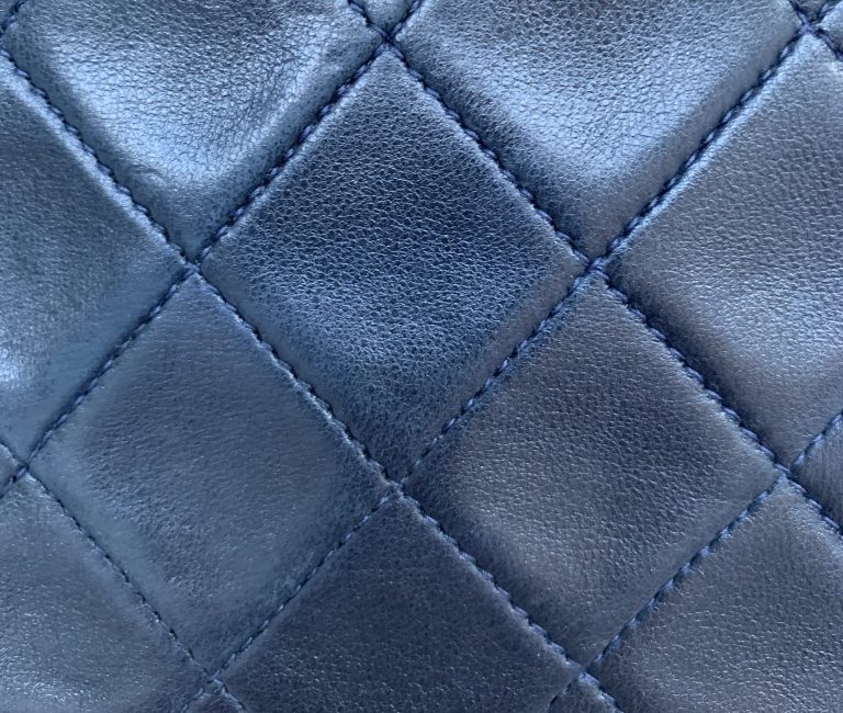 Stiching close up on a vintage chanel bag