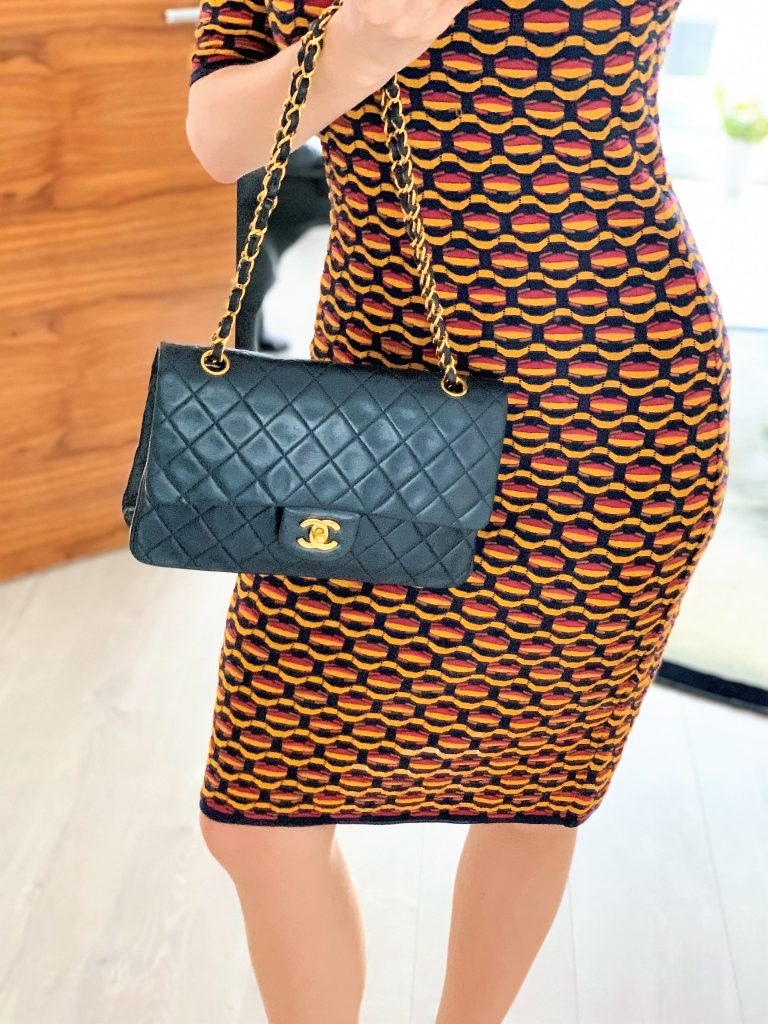 Picture of a Vintage chanel bag held on the forearm