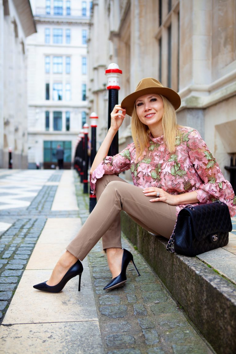 Picture of the Jimmy Choo Romy heels while sitting on a curb