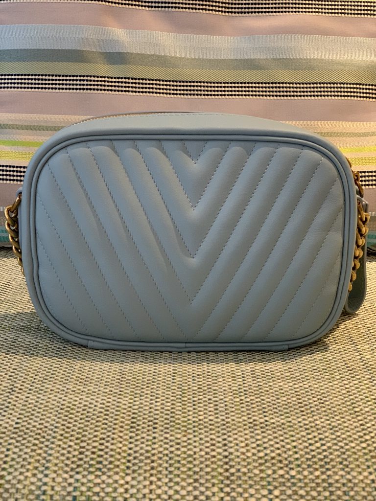 The back of Louis Vuitton new wave camera bag