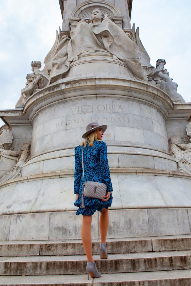 Saint Laurent bag photographed next to the Queen Victoria statue