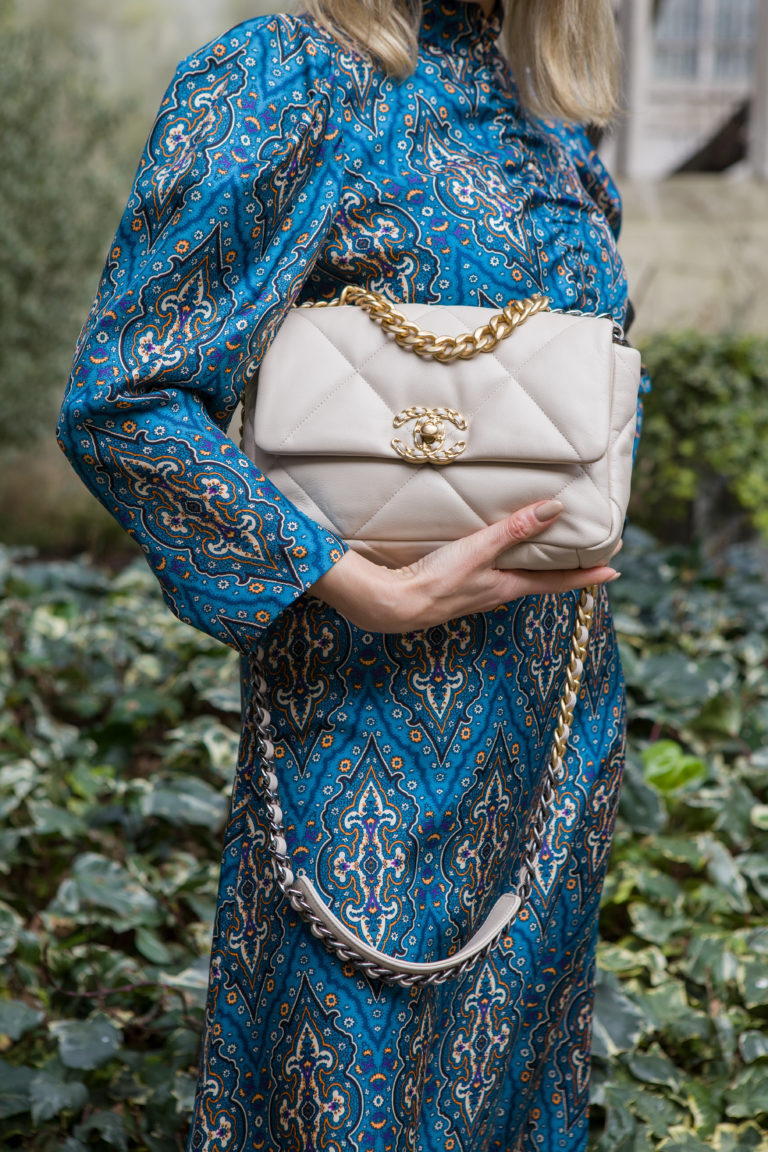 Picture of Chanel 19 bag held under arm